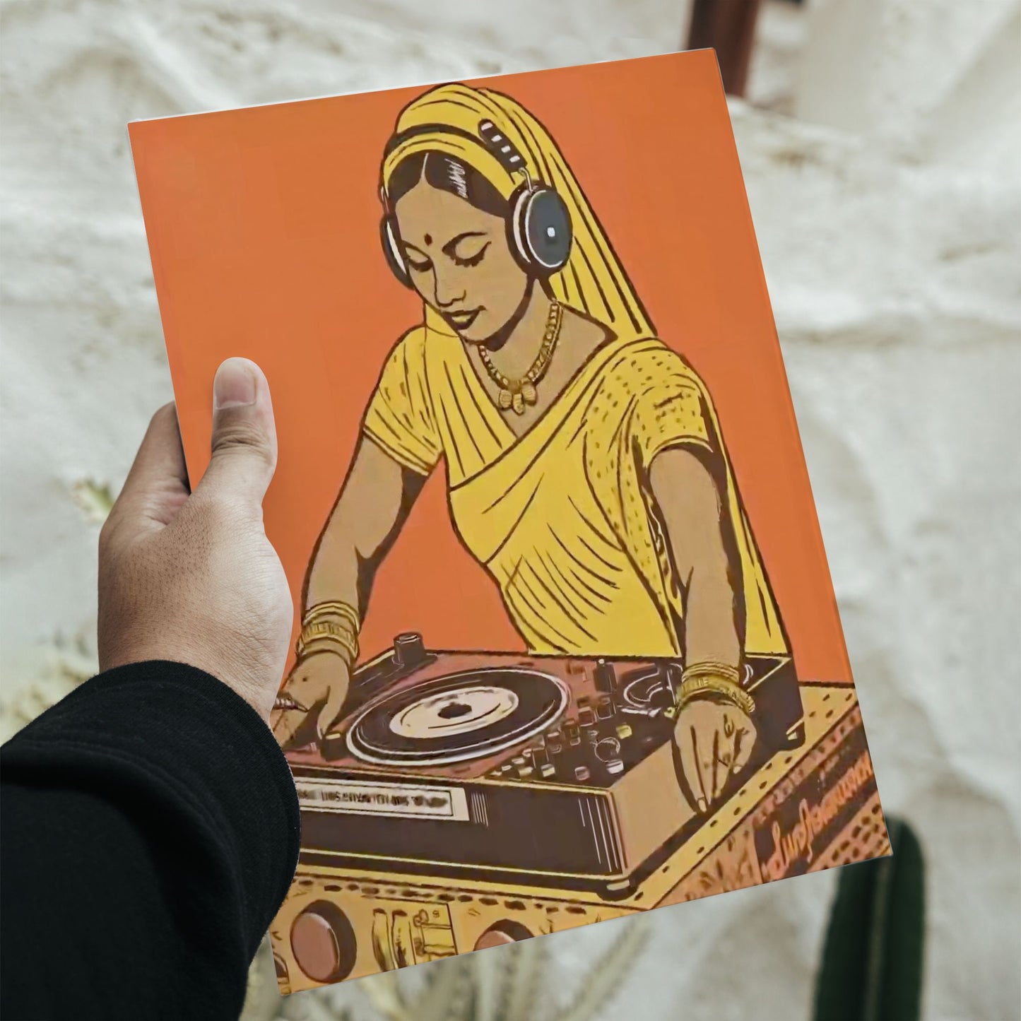 Retro Indian woman DJ wearing a yellow saree and headphones operating a turntable on a 16.5 by 11.7 inch art poster.