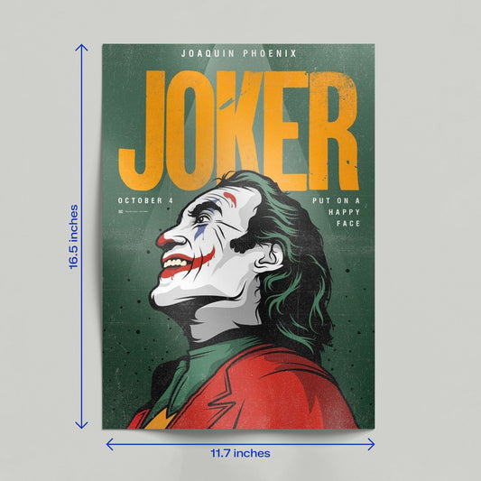 Hand holding a Joker Joaquin Phoenix illustrated art print with a green background and "Put on a Happy Face" text.