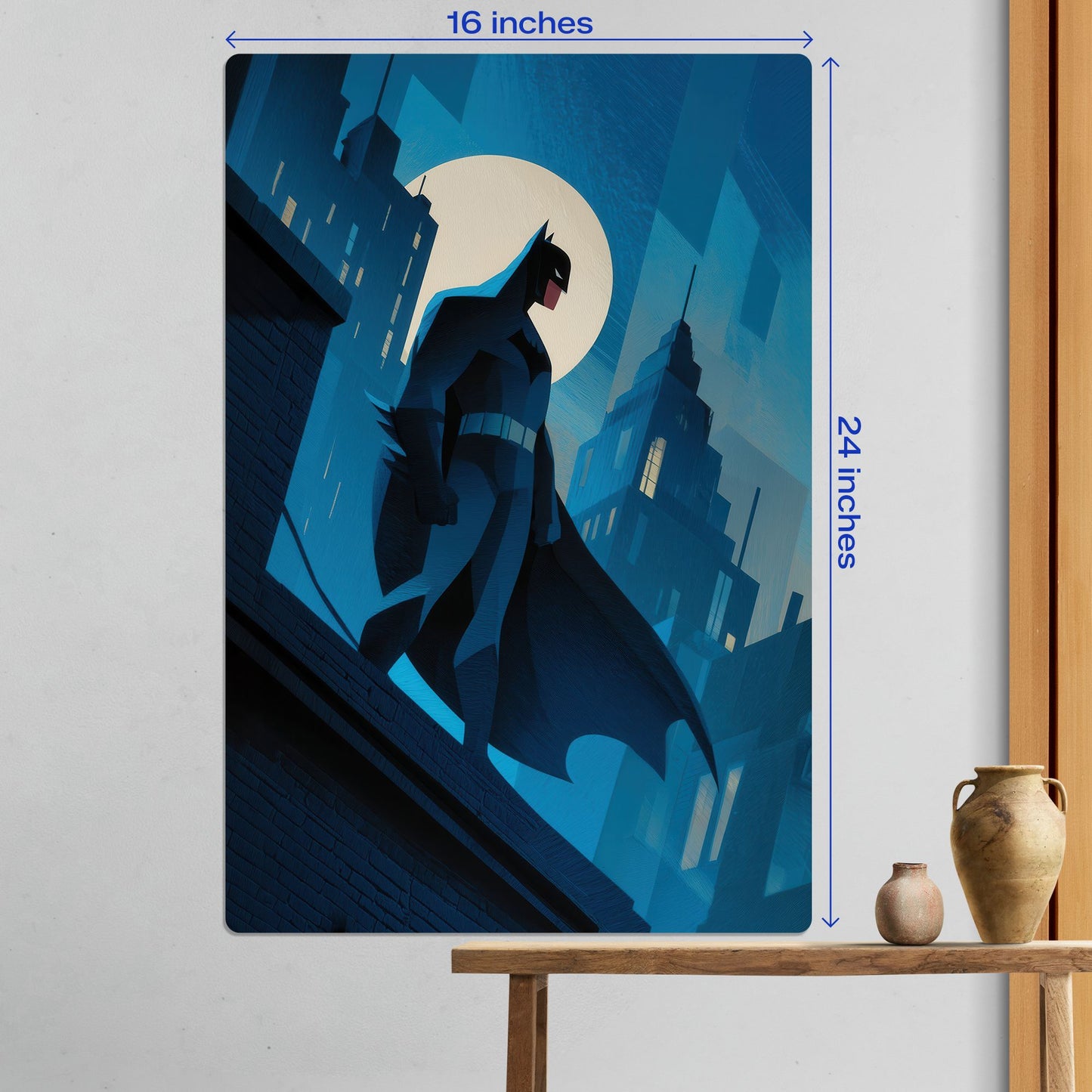 Large 16x24 inch Batman Gotham City minimalist metal poster displayed on a white wall above a wooden console table.