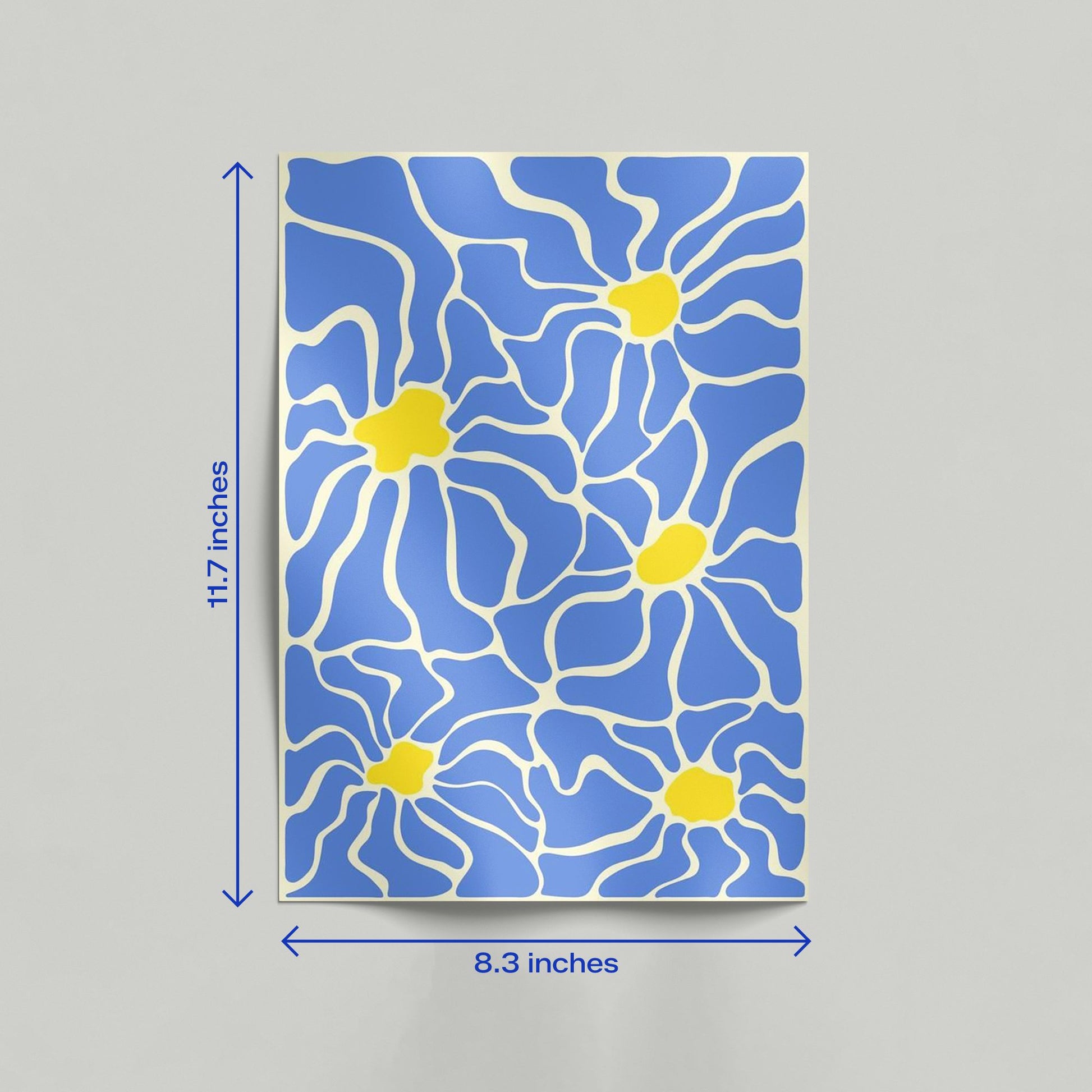 Blue floral abstract organic pattern art print leaning against a wall in a clean home interior.