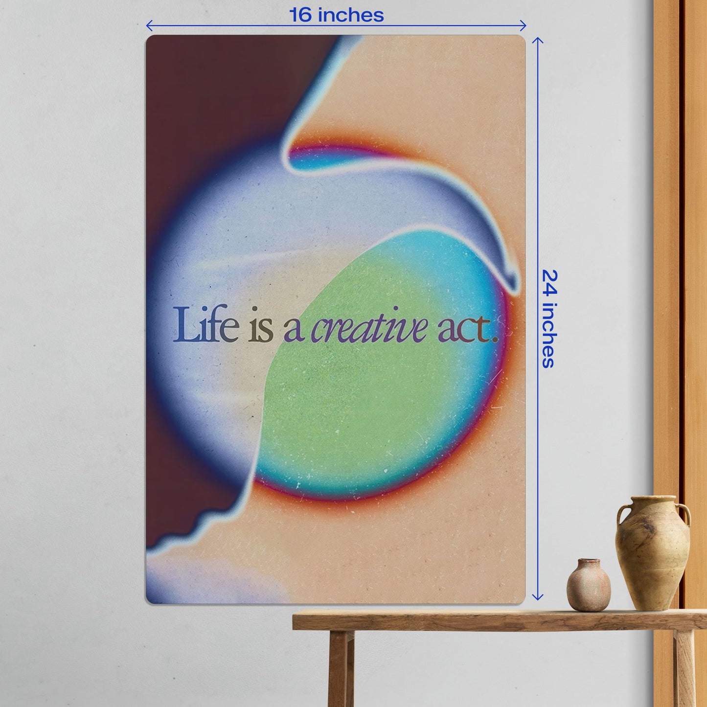 Large 16 by 24 inch Life is a creative act gradient metal poster styled on a minimalist wall in a living room.