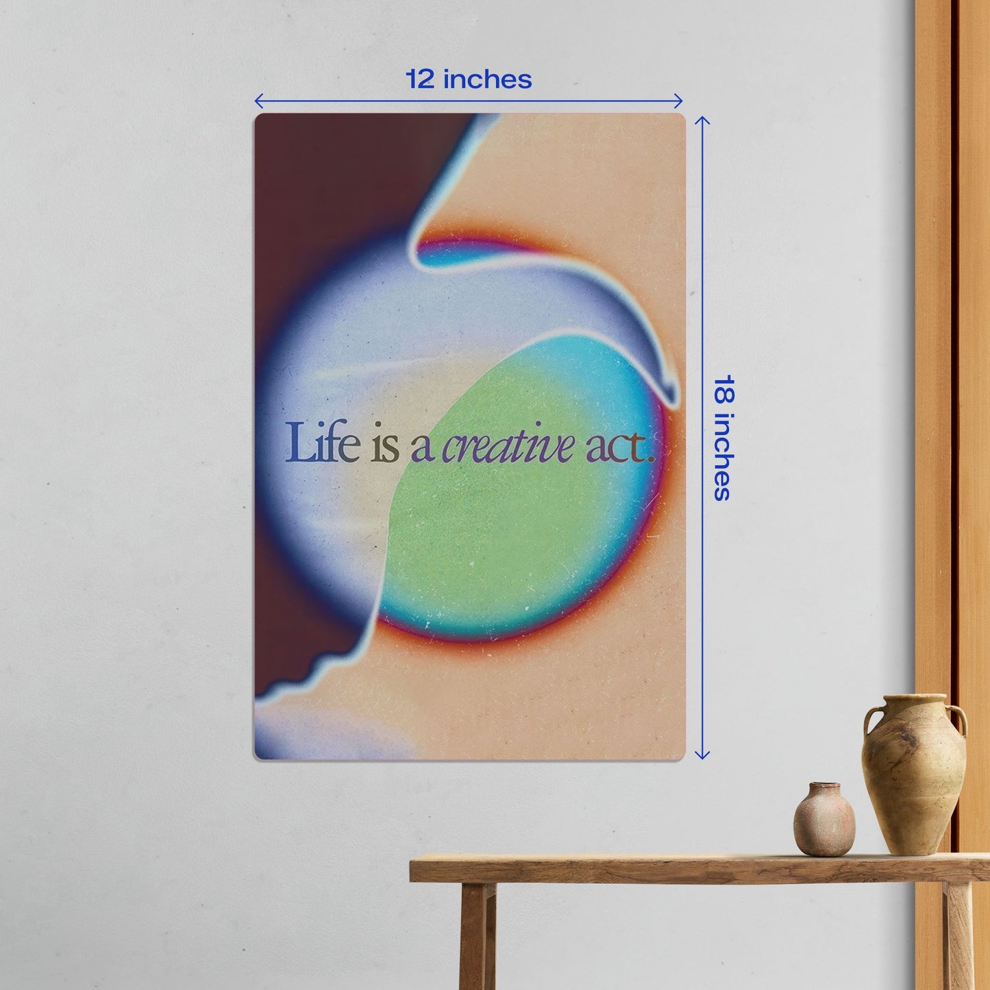 Medium 12 by 18 inch Life is a creative act gradient metal wall art with size labels in a modern interior.