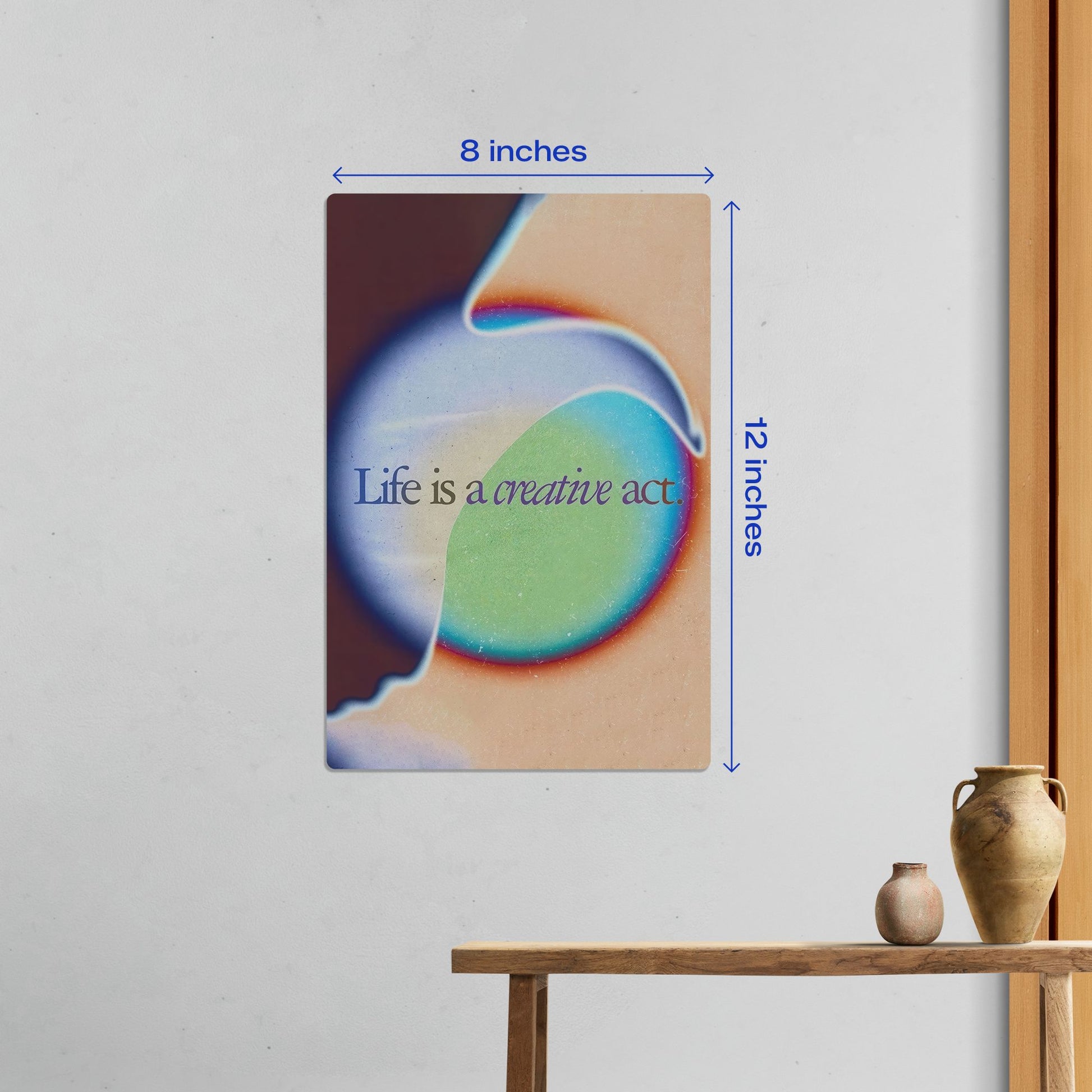 Small 8 by 12 inch Life is a creative act aura poster with dimension markings shown in a home office setting.