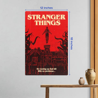 Medium 12x18 inch Stranger Things Max Mayfield metal poster centered on a white wall above a wooden console table.