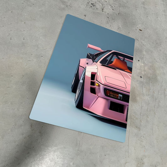 pink porsche 911 widebody jdm metal poster resting on a sleek industrial concrete surface