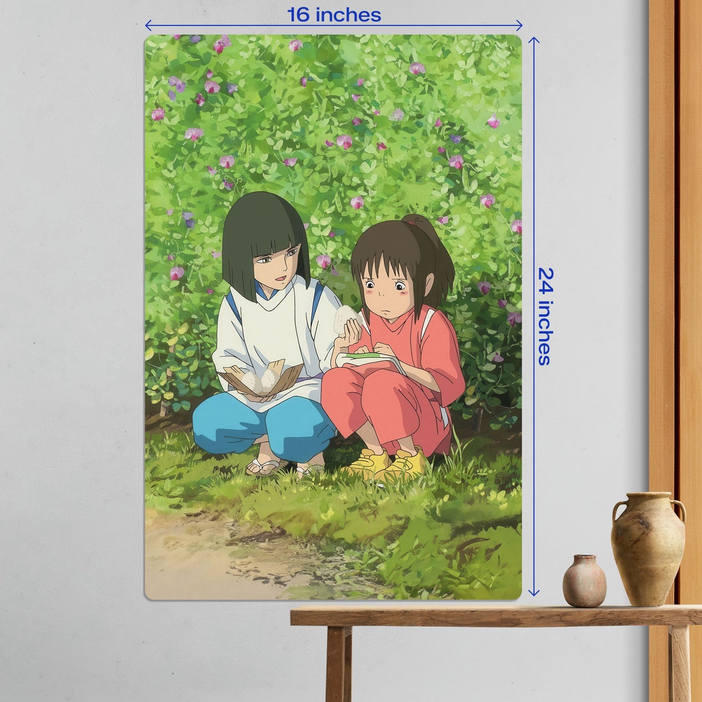 Large 16x24 inch Spirited Away Chihiro and Haku metal poster displayed as wall art above a wooden table.