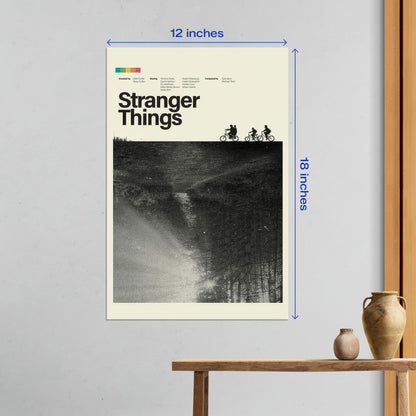 Medium 12x18 inch Stranger Things metal poster displayed on a white wall featuring the iconic silhouette of kids on bicycles.