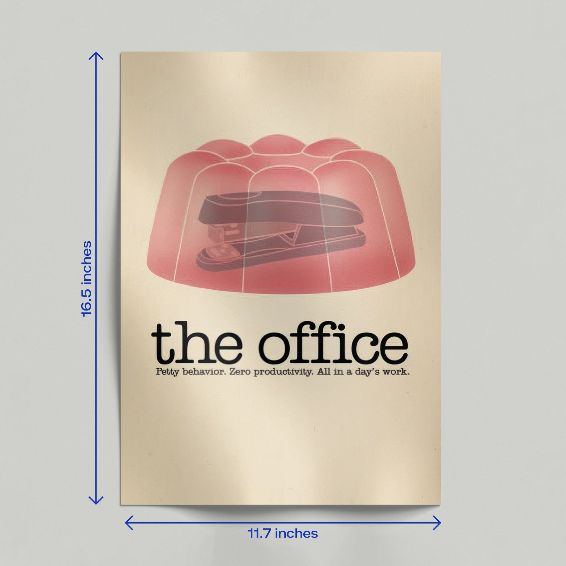 A person holding a physical high-quality print of The Office minimalist poster featuring the stapler in jello and show tagline.
